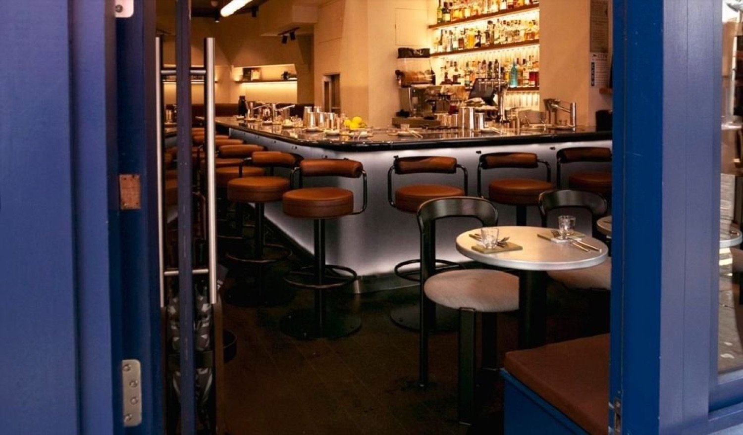 Guests at the bar inside Atelier Coupette