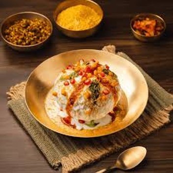 A bowl of Haldiram&rsquo;s chaat topped with pomegranate, sev and chutneys